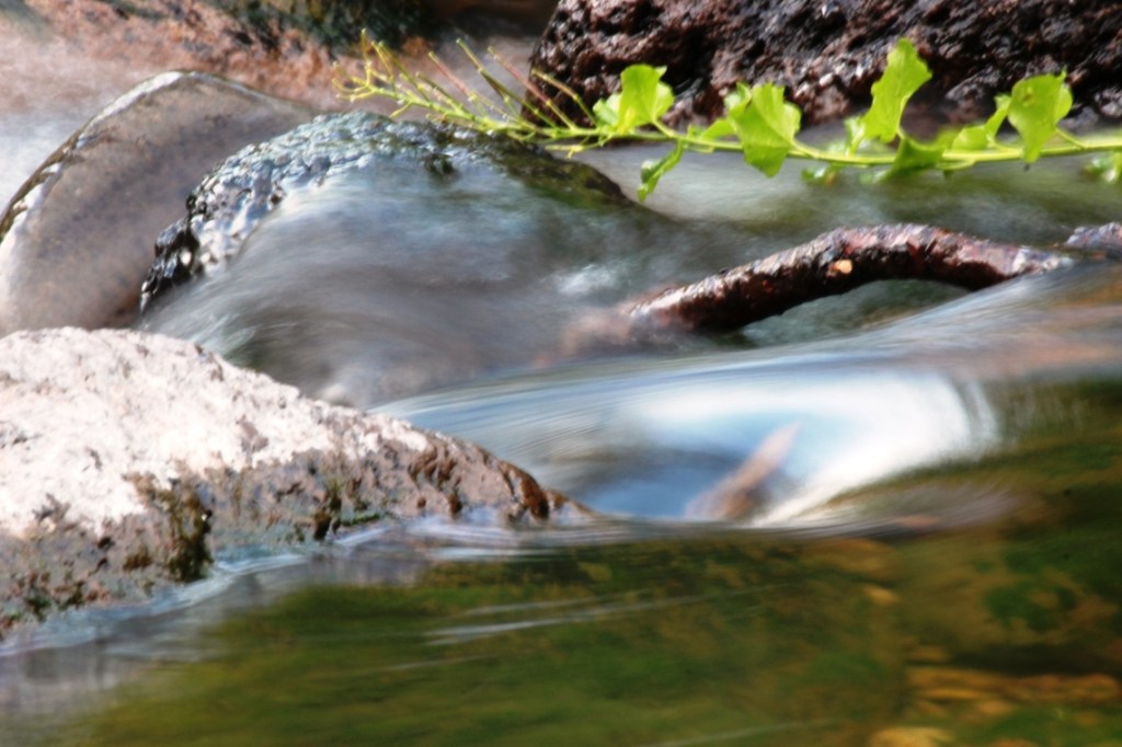 water flowing down river